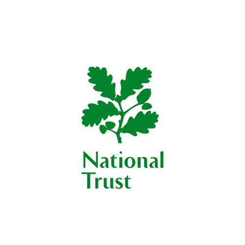 The National Trust logo features a green silhouette of an oak branch with leaves and acorns, reflecting the heritage that essex architects often cherish, above the words "National Trust" on a white background.